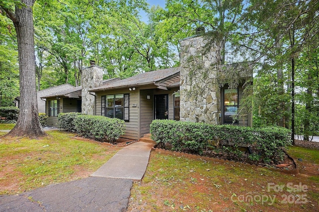 392 Tall Oaks Trl, Fort Mill, SC 29715 - view of front of property with a chimney and stone siding
