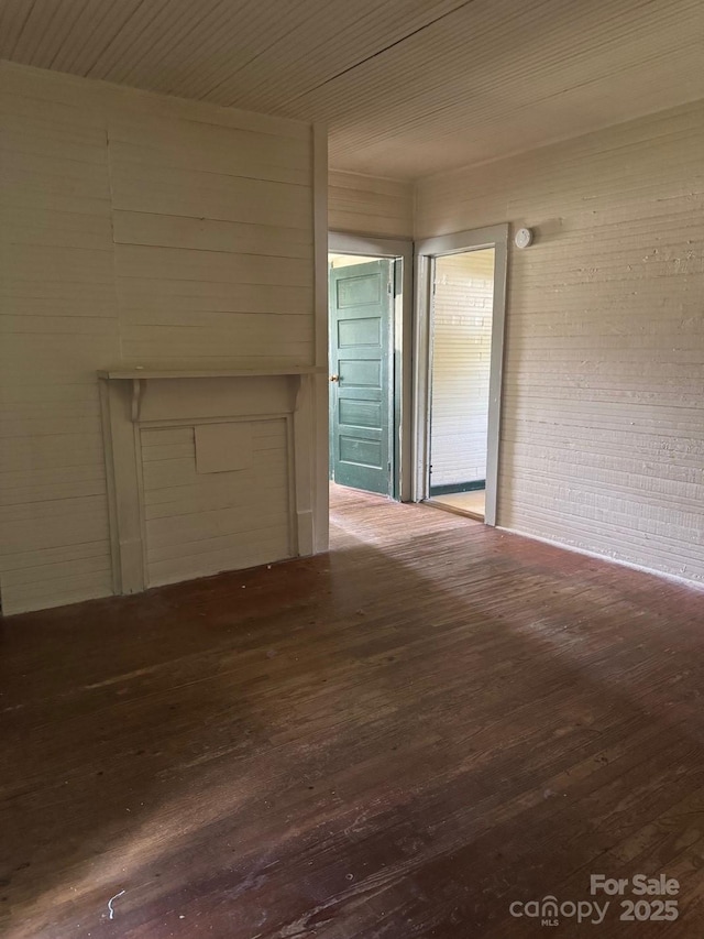 206 13th St, Belmont, NC 28012 - unfurnished living room featuring hardwood / wood-style floors