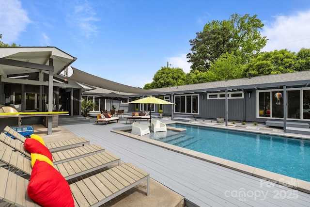 2121 Valencia Ter, Charlotte, NC 28226 - swimming pool featuring a wooden deck and an outdoor living space
