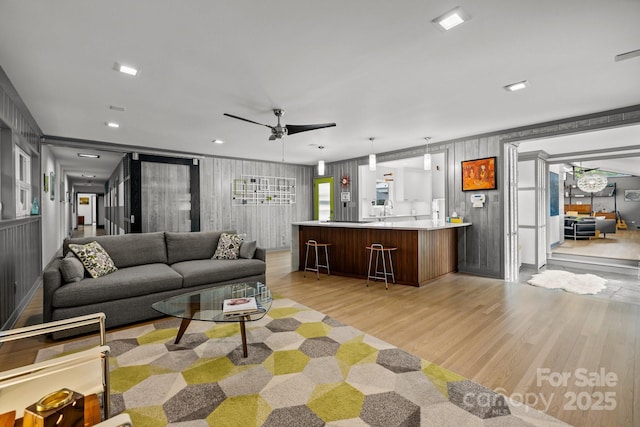 2121 Valencia Ter, Charlotte, NC 28226 - living area with light wood-type flooring and ceiling fan