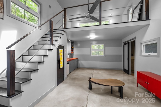 2121 Valencia Ter, Charlotte, NC 28226 - garage featuring baseboards and a sink