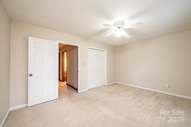 1330 5th St NE Unit 145, Hickory, NC 28601 - unfurnished bedroom featuring light carpet, baseboards, and a closet