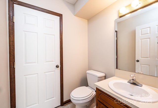 1330 5th St NE Unit 145, Hickory, NC 28601 - bathroom with toilet, vanity, and tile patterned floors