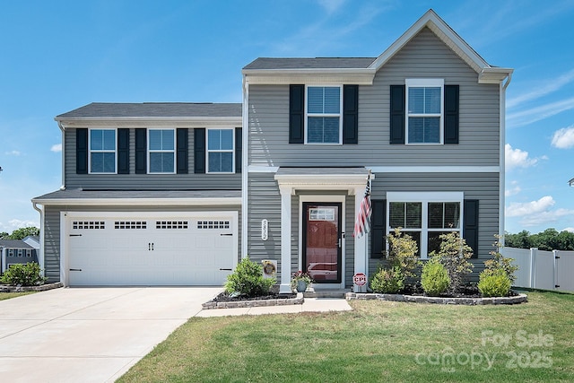 traditional-style house featuring driveway and a garage