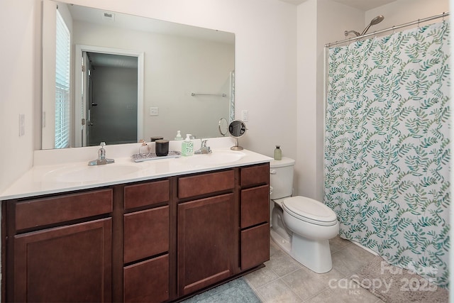 full bathroom with tile patterned flooring, toilet, double vanity, and a shower with shower curtain