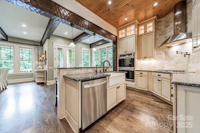 157 Dedham Loop, Mooresville, NC 28117 - kitchen featuring appliances with stainless steel finishes, wall chimney exhaust hood, dark wood-type flooring, a sink, and wooden ceiling