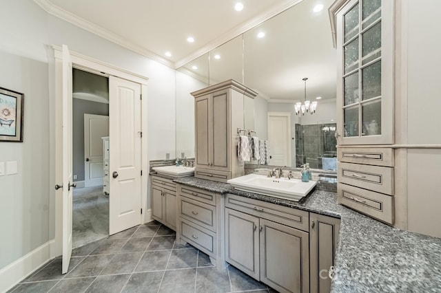 157 Dedham Loop, Mooresville, NC 28117 - bathroom featuring ornamental molding, double vanity, tiled shower, a chandelier, and recessed lighting