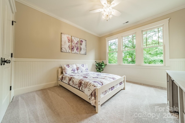 157 Dedham Loop, Mooresville, NC 28117 - bedroom featuring light carpet, wainscoting, ornamental molding, and a ceiling fan