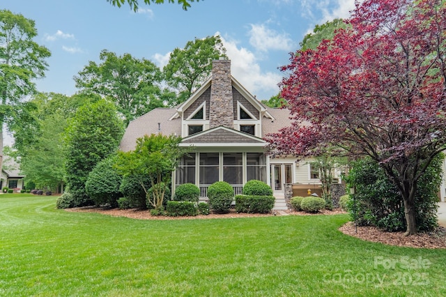 157 Dedham Loop, Mooresville, NC 28117 - rear view of house with a sunroom, a lawn, a chimney, a shingled roof, and french doors