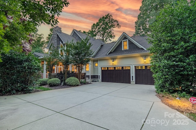 157 Dedham Loop, Mooresville, NC 28117 - craftsman house with an attached garage, concrete driveway, a chimney, and roof with shingles