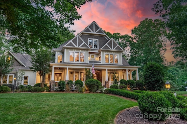 157 Dedham Loop, Mooresville, NC 28117 - view of front facade featuring a yard and a porch