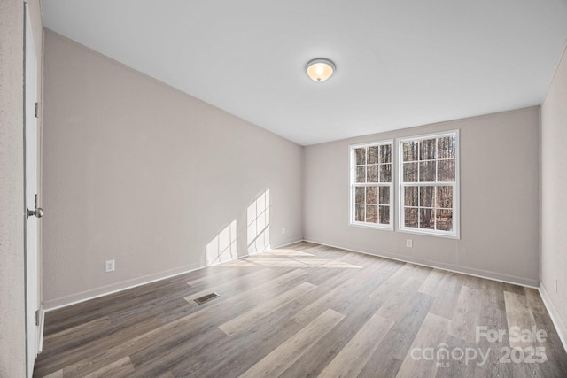 1370 Poole Rd, Salisbury, NC 28146 - unfurnished room with wood finished floors and baseboards