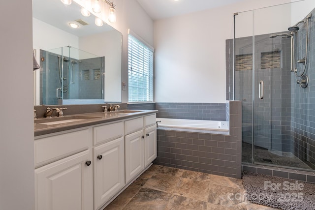 5656 Cambridge Bay Dr, Charlotte, NC 28269 - bathroom with a shower stall, double vanity, and a bath
