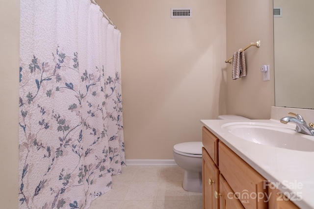 5656 Cambridge Bay Dr, Charlotte, NC 28269 - bathroom with toilet, vanity, baseboards, tile patterned floors, and curtained shower