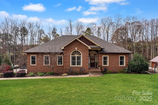148 Fairway Dr, Forest City, NC 28043 - view of front facade featuring brick siding and roof with shingles