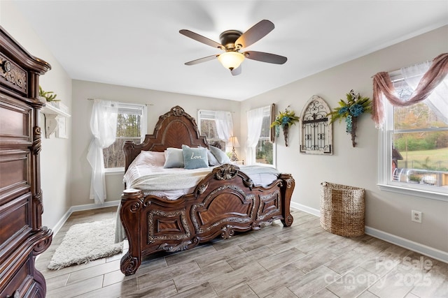 148 Fairway Dr, Forest City, NC 28043 - bedroom with wood finish floors, baseboards, and a ceiling fan