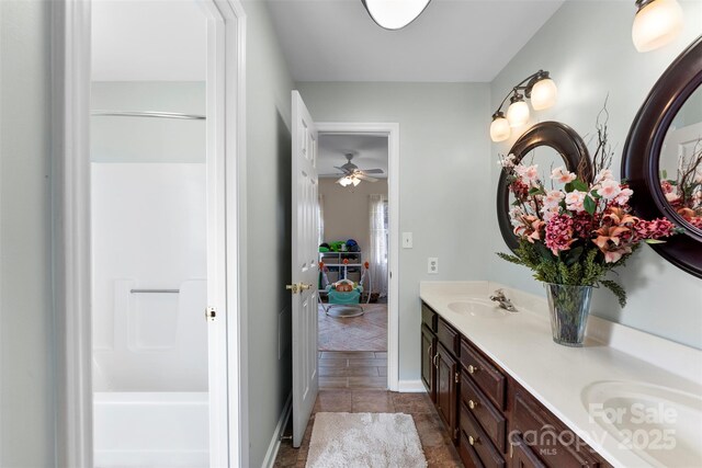 148 Fairway Dr, Forest City, NC 28043 - full bath with double vanity, a shower, tile patterned flooring, a ceiling fan, and a tub