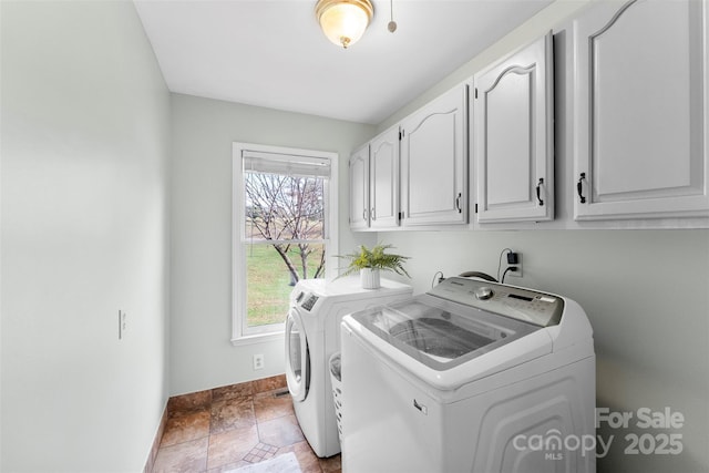 148 Fairway Dr, Forest City, NC 28043 - clothes washing area featuring independent washer and dryer, cabinet space, baseboards, and stone finish flooring