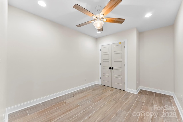 148 Fairway Dr, Forest City, NC 28043 - empty room featuring light wood-style flooring, a ceiling fan, baseboards, and recessed lighting