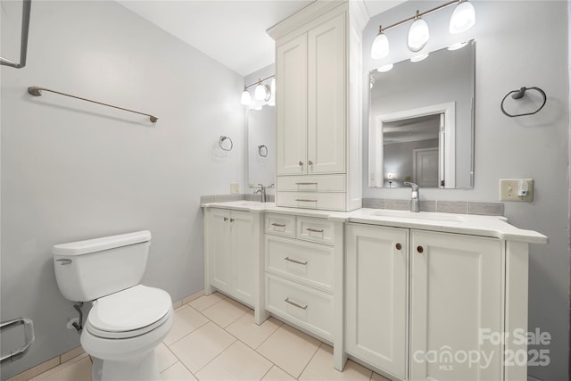 64 Timberidge Dr, Lake Wylie, SC 29710 - full bathroom featuring double vanity, toilet, and tile patterned floors