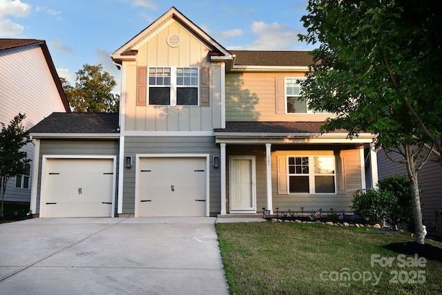 161 Old Harbor Dr, Mount Gilead, NC 27306 - traditional home with board and batten siding, driveway, a front yard, and a shingled roof
