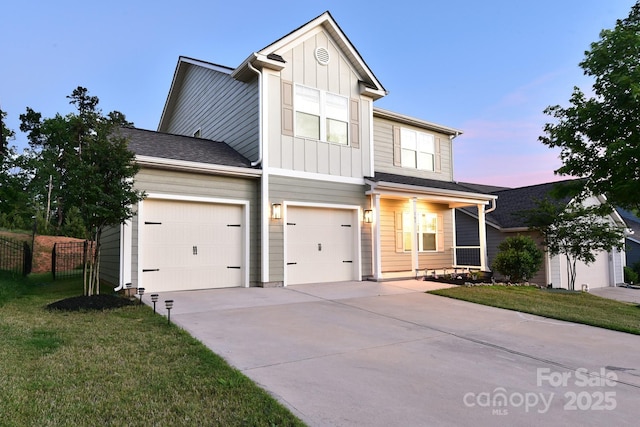 161 Old Harbor Dr, Mount Gilead, NC 27306 - traditional-style home with concrete driveway, board and batten siding, and an attached garage