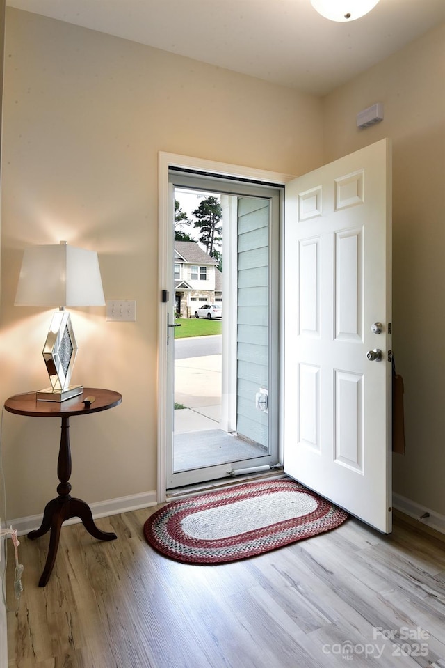 161 Old Harbor Dr, Mount Gilead, NC 27306 - foyer entrance featuring wood finished floors and baseboards