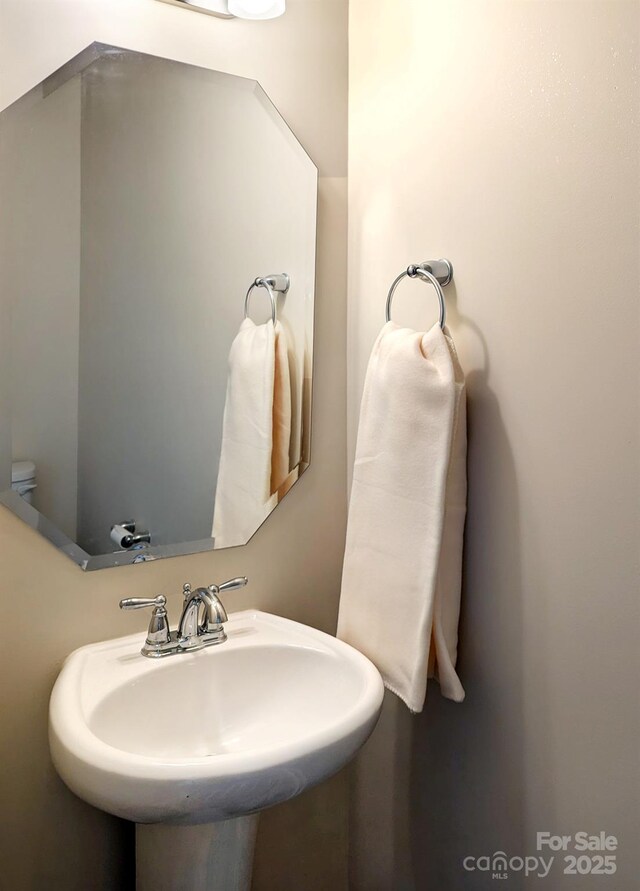 161 Old Harbor Dr, Mount Gilead, NC 27306 - half bath featuring a sink