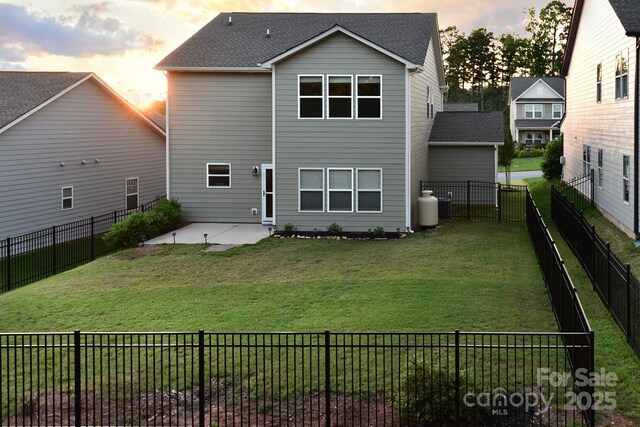 161 Old Harbor Dr, Mount Gilead, NC 27306 - rear view of property with a patio area
