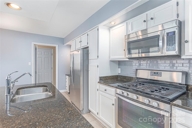 111 Clubwood Ct, Asheville, NC 28803 - kitchen featuring stainless steel appliances, a sink, white cabinetry, and recessed lighting
