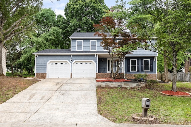 2112 Flint Glenn Ln, Charlotte, NC 28262 - view of front of home with concrete driveway, brick siding, an attached garage, and a porch