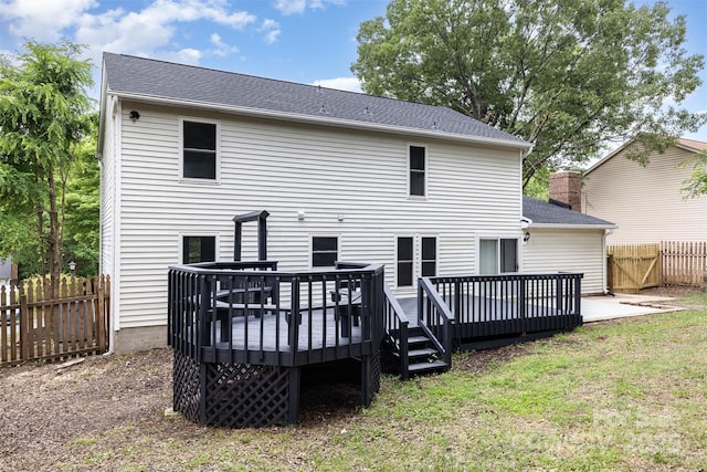 2112 Flint Glenn Ln, Charlotte, NC 28262 - back of house featuring a wooden deck