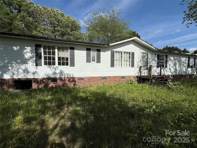 33 Honeysuckle Ln, Taylorsville, NC 28681 - view of side of home with crawl space