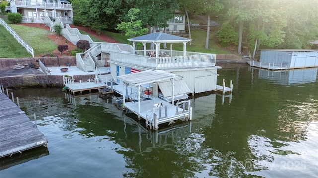 24264 Strand Dr, Albemarle, NC 28001 - dock area with a water view, stairway, boat lift, and a gazebo