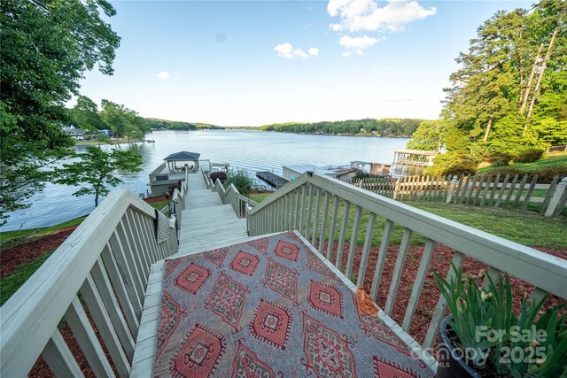 24264 Strand Dr, Albemarle, NC 28001 - dock area with a water view, fence, and boat lift