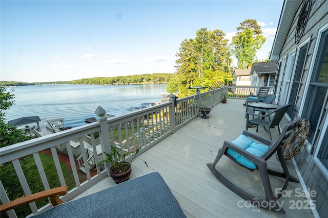 24264 Strand Dr, Albemarle, NC 28001 - wooden terrace with a water view