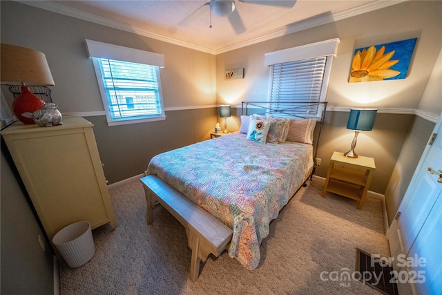 24264 Strand Dr, Albemarle, NC 28001 - carpeted bedroom featuring ornamental molding, a ceiling fan, and baseboards