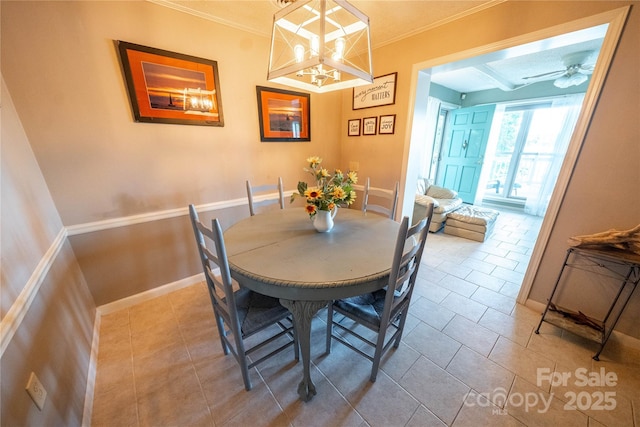 24264 Strand Dr, Albemarle, NC 28001 - dining area featuring ornamental molding, tile patterned floors, baseboards, and ceiling fan