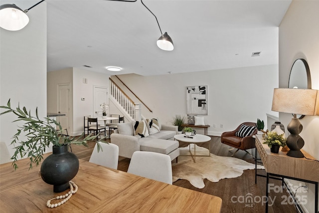 400 N Church St Unit 226, Charlotte, NC 28202 - dining space with stairs, wood finished floors, and baseboards