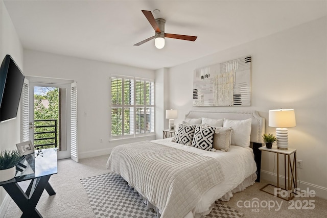 400 N Church St Unit 226, Charlotte, NC 28202 - carpeted bedroom with baseboards, access to exterior, and ceiling fan