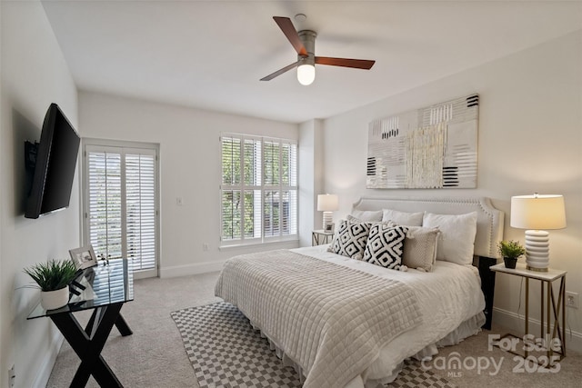 400 N Church St Unit 226, Charlotte, NC 28202 - carpeted bedroom with baseboards, ceiling fan, and access to exterior