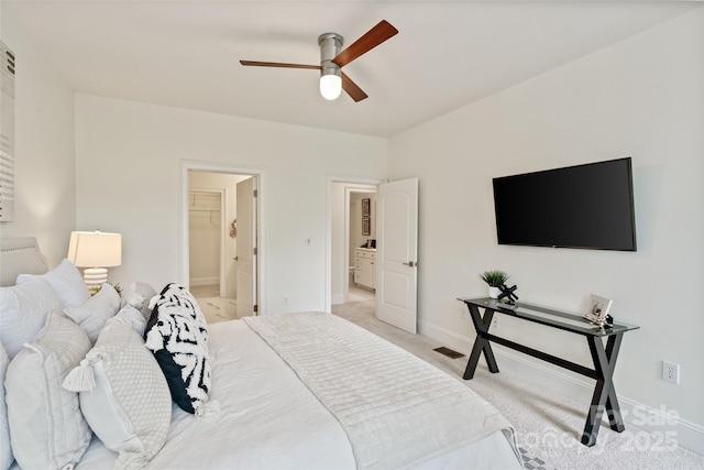400 N Church St Unit 226, Charlotte, NC 28202 - bedroom featuring light colored carpet, baseboards, and ceiling fan