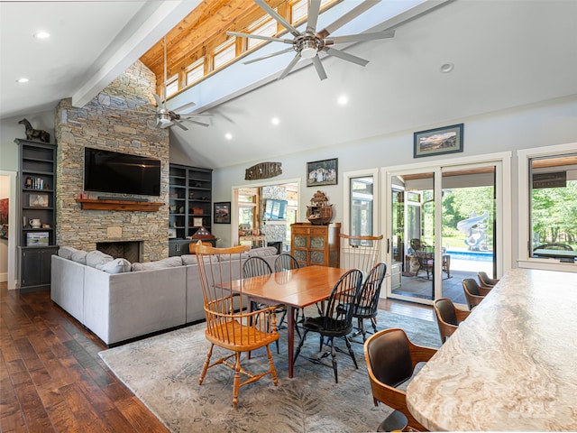5 Bridgewater Dr, Fletcher, NC 28732 - dining room with ceiling fan, dark wood-type flooring, beam ceiling, a stone fireplace, and high vaulted ceiling