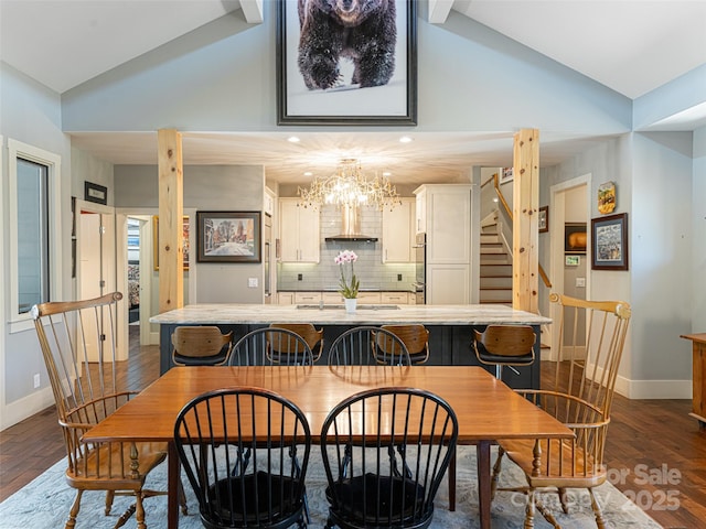 5 Bridgewater Dr, Fletcher, NC 28732 - dining room with high vaulted ceiling, baseboards, stairs, dark wood-type flooring, and a chandelier