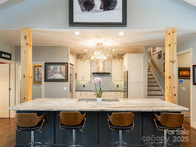 5 Bridgewater Dr, Fletcher, NC 28732 - kitchen with dark wood finished floors, recessed lighting, white cabinets, decorative backsplash, and a chandelier