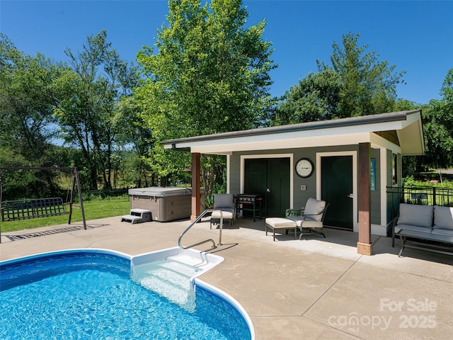 5 Bridgewater Dr, Fletcher, NC 28732 - view of swimming pool featuring a hot tub, a patio area, and an outdoor structure