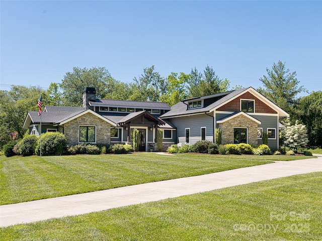 5 Bridgewater Dr, Fletcher, NC 28732 - craftsman-style home with stone siding, a front lawn, and a chimney