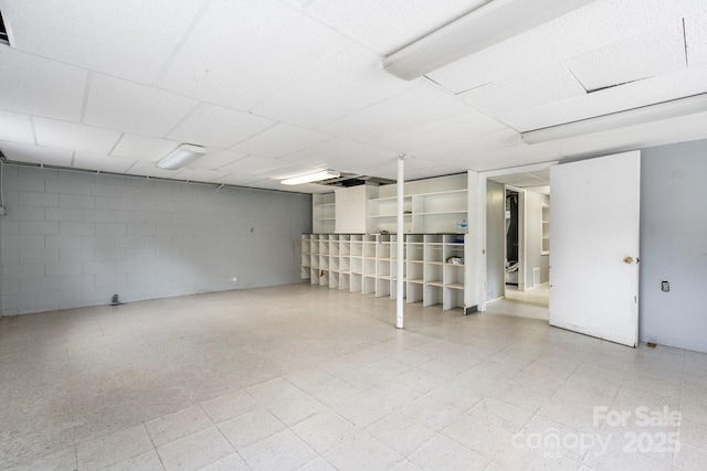 1753 28th St NE, Hickory, NC 28601 - finished below grade area featuring concrete block wall, tile patterned floors, and a drop ceiling