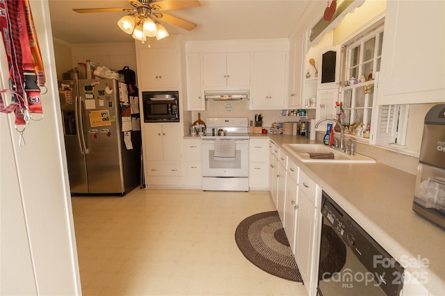 kitchen featuring stainless steel fridge, electric range, black microwave, dishwasher, and light floors