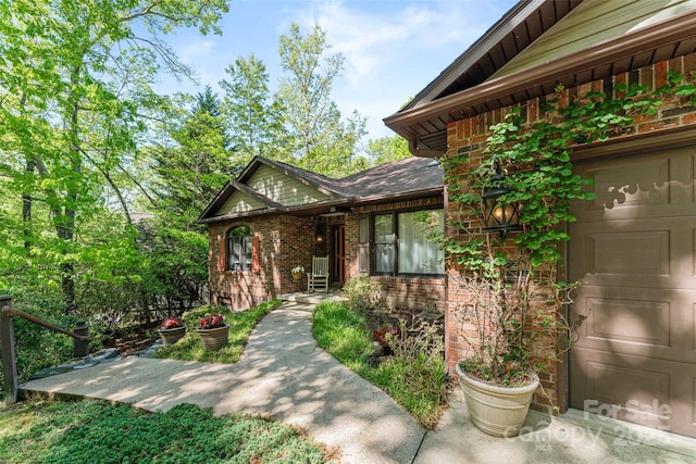 property entrance with brick siding